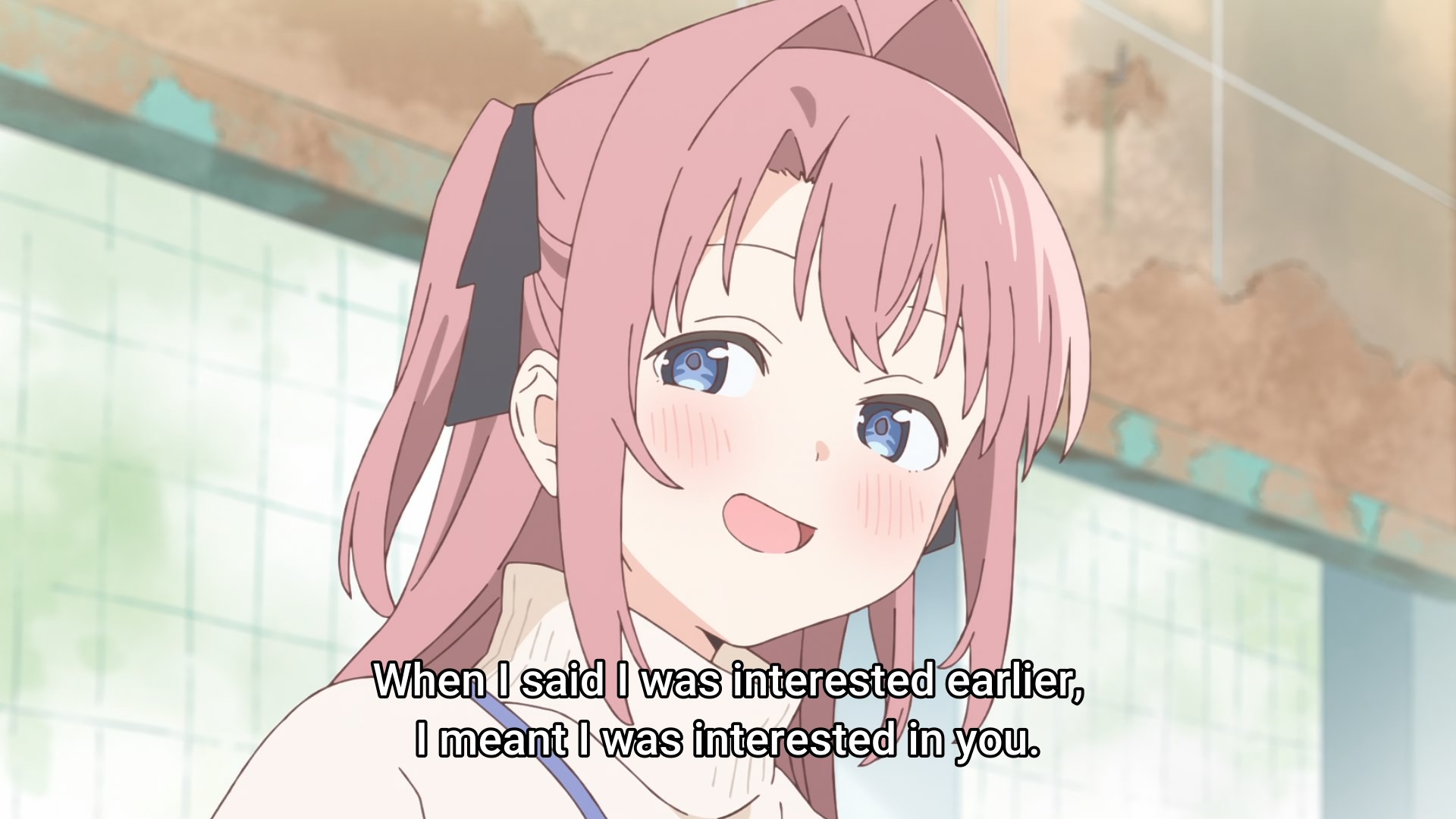 A pink haired anime girl blushes gently and smiles as she says that when she said she was interested earlier, she was interested in you